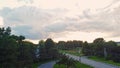 Drone Crane shot up, showing the stormy clouds and seagull flying in the sky at sunset