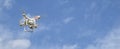 Drone with digital camera flying in the sky Royalty Free Stock Photo