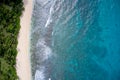 Drone field of view of empty coastline and waves meeting beach Praslin, Seychelles