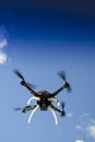 Drone in flight with cloudy sky Royalty Free Stock Photo