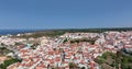 Drone flight over Portuguese coastal town Bairro Monte Vistoso and Rio Mira