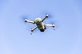 A drone fliyng with blue sky. Royalty Free Stock Photo