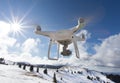 Drone flying above mountain top in winter Royalty Free Stock Photo