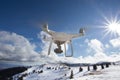 Drone flying above mountain top in winter Royalty Free Stock Photo