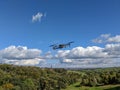 Drone flying against blue sky Royalty Free Stock Photo