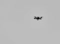 drone flying against a blue sky Royalty Free Stock Photo