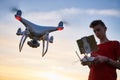 Drone flying. copter pilotage at sunset Royalty Free Stock Photo