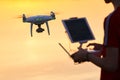 Drone flying. copter pilotage at sunset Royalty Free Stock Photo