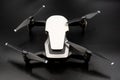 Drone - Flying in the dark, on black background. Closeup on dark. Portable drones, View on the drones gimbal and camera