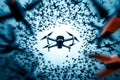 A drone flying through a circle of birds in the sky Royalty Free Stock Photo