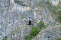 Drone flying with mounted digital camera used for photographing and filming. quadcopter flying hovering over mountains Royalty Free Stock Photo