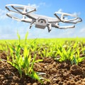 Drone flying over field.