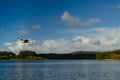 Drone flying over a lake at sunset Royalty Free Stock Photo