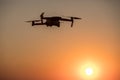 Drone flying at sunrise Royalty Free Stock Photo
