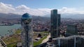 Drone footage. The drone flies around the popular attraction in Batumi Alphabet Tower on the Black Sea coast. Modern building, obs