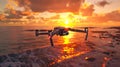 A Drone Flies Over the Ocean at Sunset. Capturing the Beauty of Nature, Perfect for Technology and Travel Themes Royalty Free Stock Photo