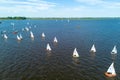 Drone image of a lake in Friesland with many small sailboats