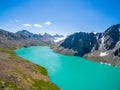 Drone Image from Mountain Lake with Snow and Blue Skyfrom Mountain Lake with Snow and Blue Sky