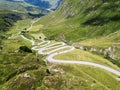 Drone image over the serpentine road through the Swiss Alps Julier Pass, Switzerland Royalty Free Stock Photo