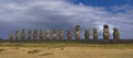 DRONE: Megalithic moai sculptures on Rapa Nui under the clear blue sunny sky.