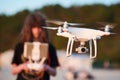 Drone operated by young man flying over an sea Royalty Free Stock Photo