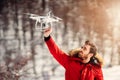 Drone operator, drone pilot holding small compact drone Royalty Free Stock Photo
