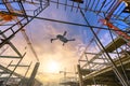 Drone over construction site. video surveillance or industrial inspection Royalty Free Stock Photo