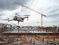 Drone over construction site. video surveillance or industrial inspection Royalty Free Stock Photo