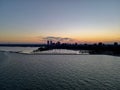 Drone over harbor with cityscape at seaside in Wisconsin at sunset Royalty Free Stock Photo