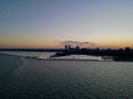 Drone over harbor with cityscape at seaside in Wisconsin at sunset Royalty Free Stock Photo