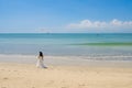 Drone over kissing bride and groom on beautiful beach, Bali