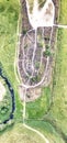 Drone overhead aerial view of Hill of Crosses (Kryziu Kalnas). It is a famous religious site in Lithuania Royalty Free Stock Photo