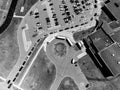 Drone overhead aerial view of a school letting out students at the end of the day. Royalty Free Stock Photo