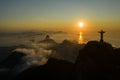 Drone, panoramic shot of a sunrise over Guanabara Bay with Christ the Redeemer statue in the foreground