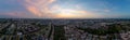 Drone panoramic view of sunset cloudy sky over Munich cityscape