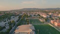 Drone peaceful small town with beautiful green football stadium. Urban districts Royalty Free Stock Photo