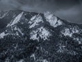 Aerial drone photo - Beautiful snow covered Flatirons mountains in Winter. Boulder, Colorado Royalty Free Stock Photo