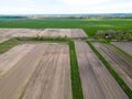 Drone photo of a plowed fields. Aerial view of a farmer\'s field. A top view of an agricultural field