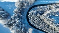 Drone photo of a sharp bend in the road with traffic in winter Royalty Free Stock Photo