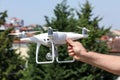 The drone and photographer man hands , The drone with the professional camera takes pictures. Royalty Free Stock Photo