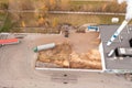 Drone photography of biomass power plant and biomass storage place during autumn day