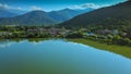 Lapota lake with green mountains reflections located in Georgia country.