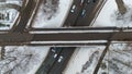 Drone photography of multiple lane highway with overpass in a city during winter Royalty Free Stock Photo