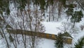 Drone photography of old abandoned wooden house in a forest during winter Royalty Free Stock Photo