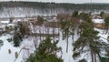 Drone photography of old abandoned wooden house in a forest during winter Royalty Free Stock Photo