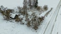 Drone photography of old abandoned wooden house in a rural landscape during winter day Royalty Free Stock Photo