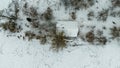 Drone photography of old abandoned wooden house in a rural landscape during winter day Royalty Free Stock Photo