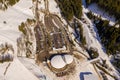 Drone photography of ski resort, parking place, mountains and forest