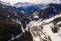 Drone photography of ski resort, parking place, mountains and forest