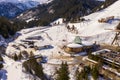 Drone photography of ski resort, parking place, mountains and forest